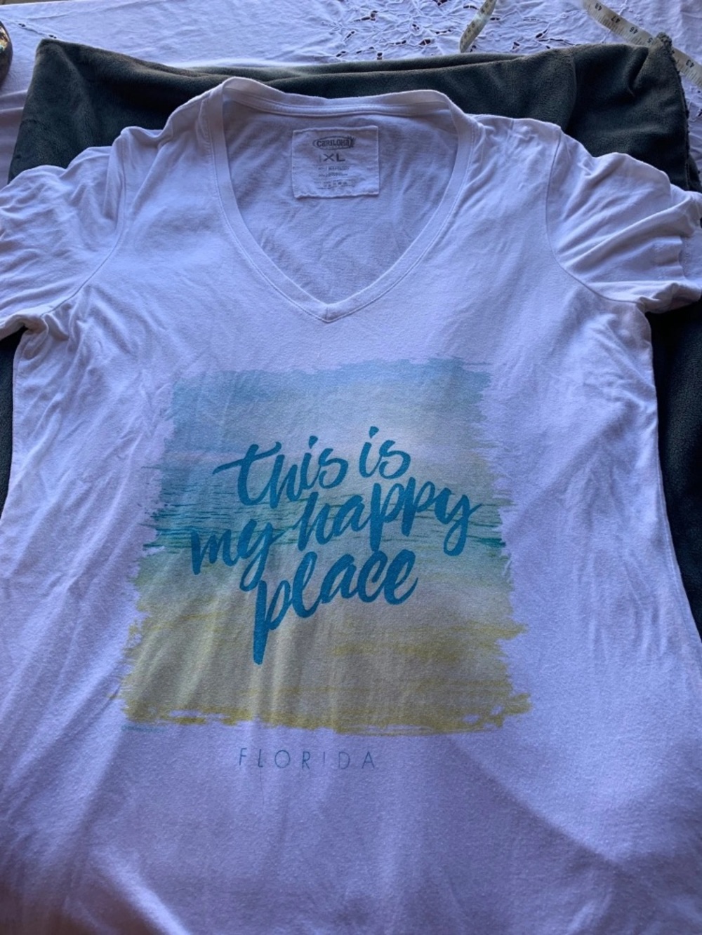 White V-Neck Tee with Aqua Script "This Is My Happy Place"
70% bamboo 30% cotton